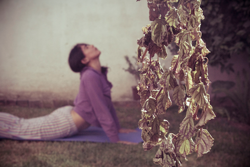 SELECTION: Misconceptions about yoga, a girl in a yoga pose on the street